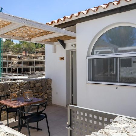 Cala Vadella Beachwalk Suites Bagian luar foto