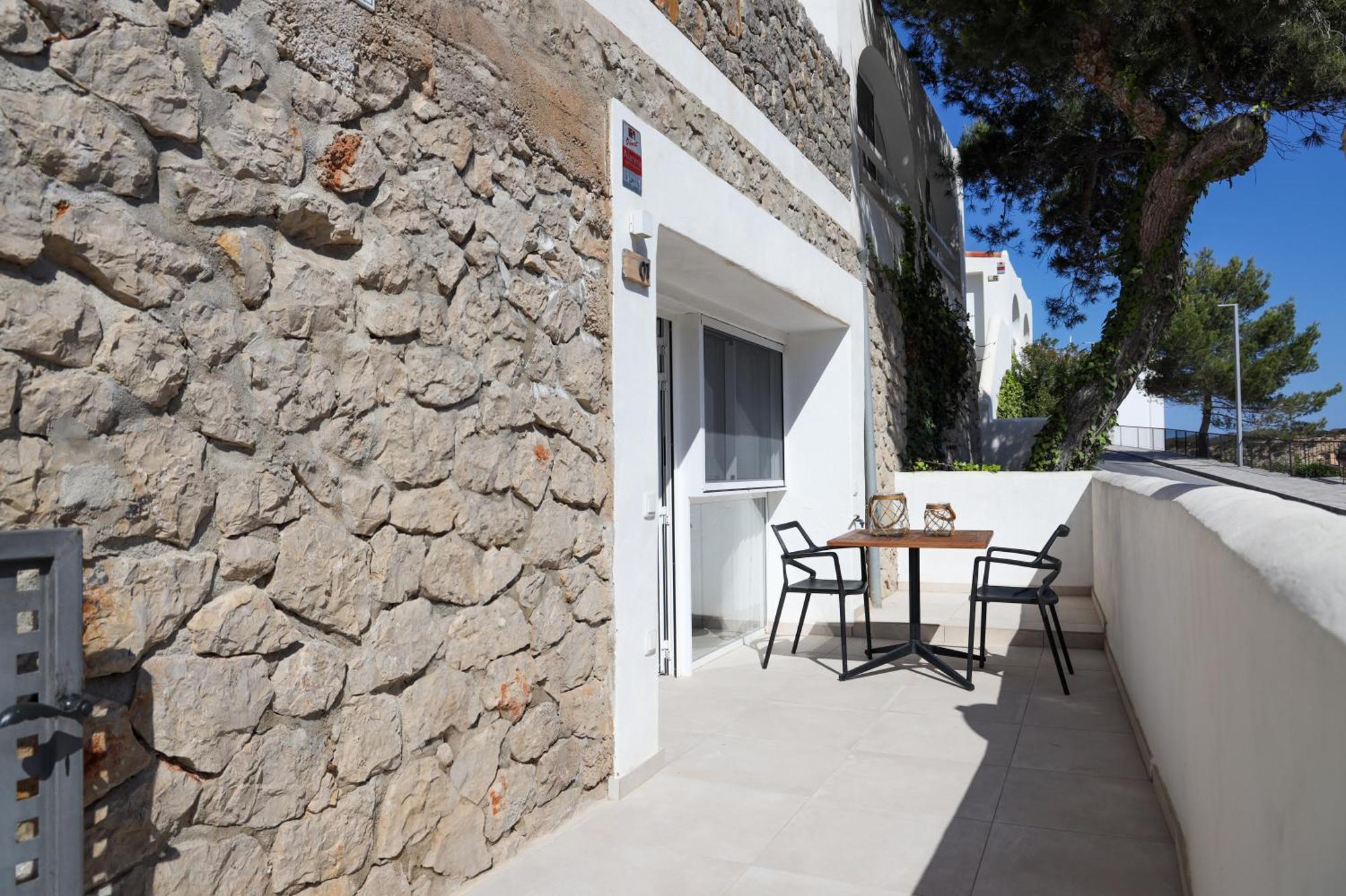 Cala Vadella Beachwalk Suites Ruang foto