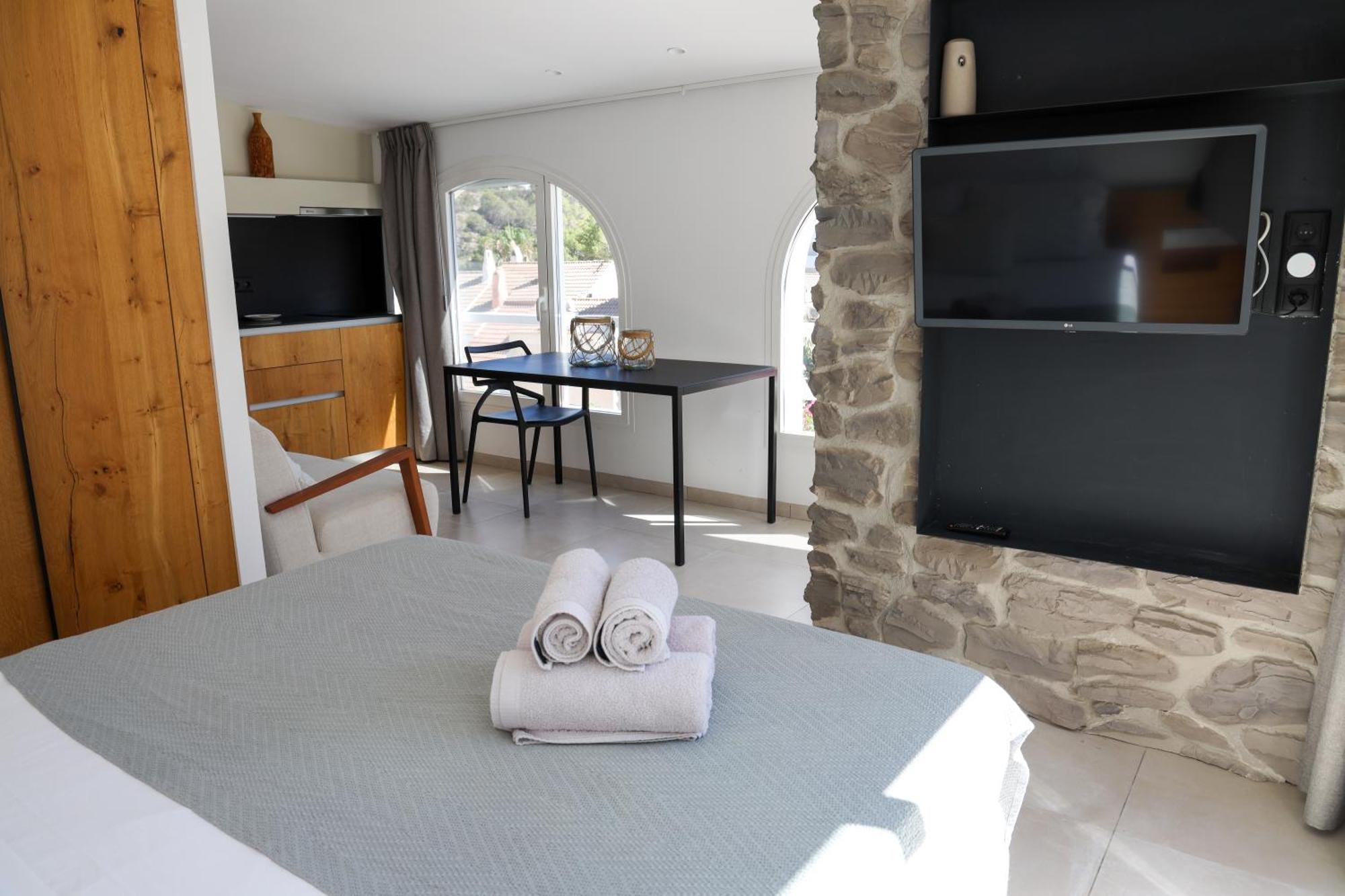 Cala Vadella Beachwalk Suites Ruang foto